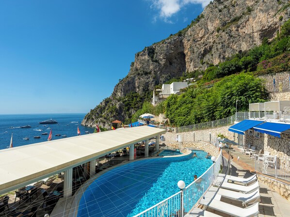 Outdoor pool, pool umbrellas, pool loungers