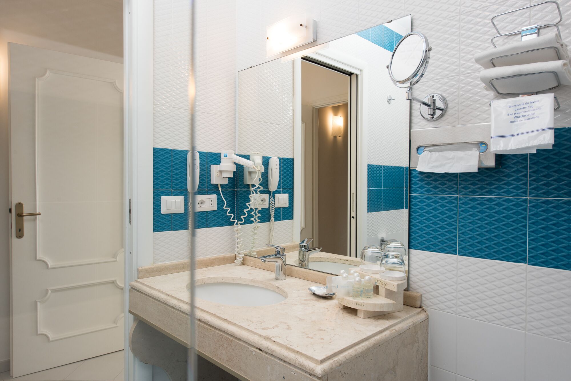 hair dryer, bidet, towels, soap