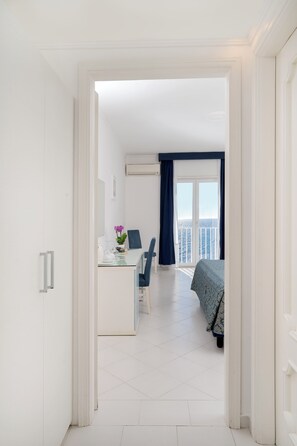 Superior Quadruple Room | Hypo-allergenic bedding, minibar, in-room safe, desk