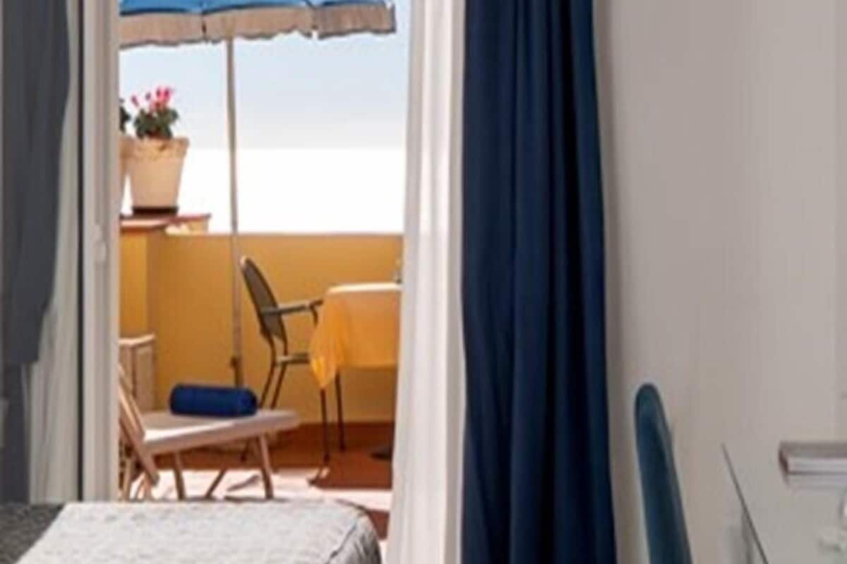 Deluxe Room, Sea View | Hypo-allergenic bedding, minibar, in-room safe, desk