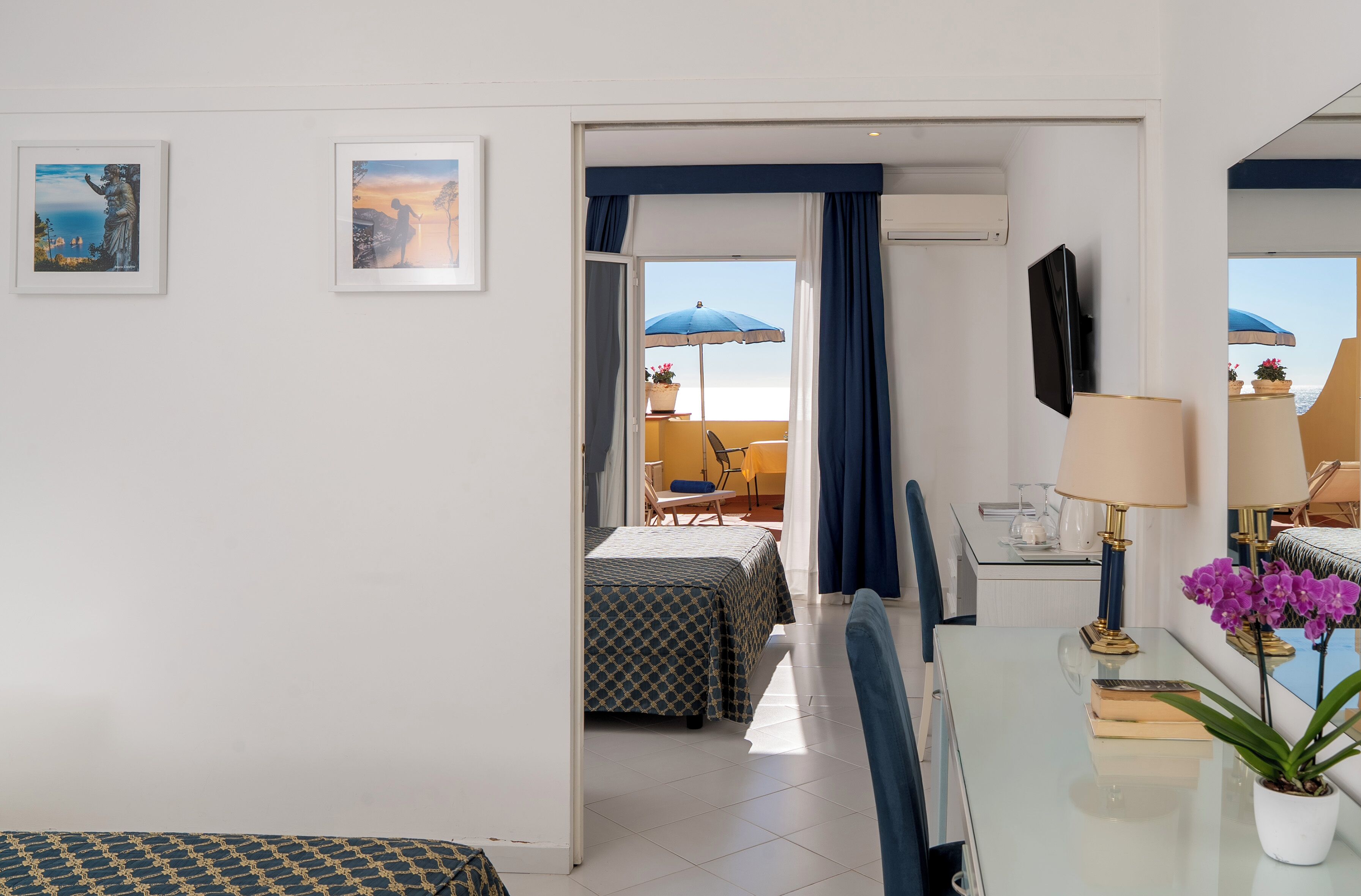 Deluxe Quadruple Room, Balcony | Hypo-allergenic bedding, minibar, in-room safe, desk