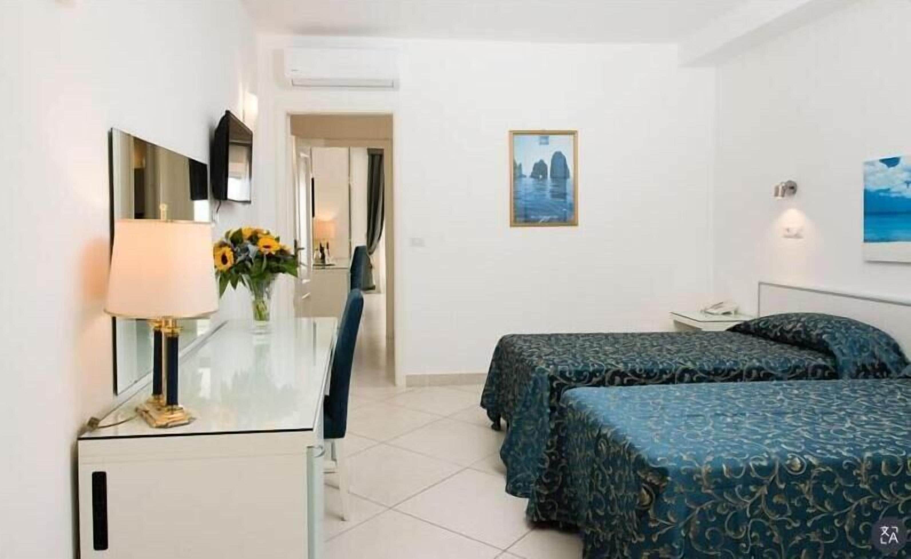 Superior Quadruple Room | Hypo-allergenic bedding, minibar, in-room safe, desk