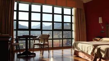 Superior Double Room | Minibar, in-room safe, desk, blackout drapes