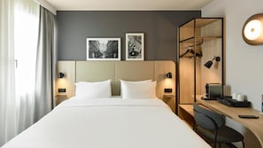 Quarto superior, 1 cama King | Roupas de cama premium, escrivaninha, cortinas blackout