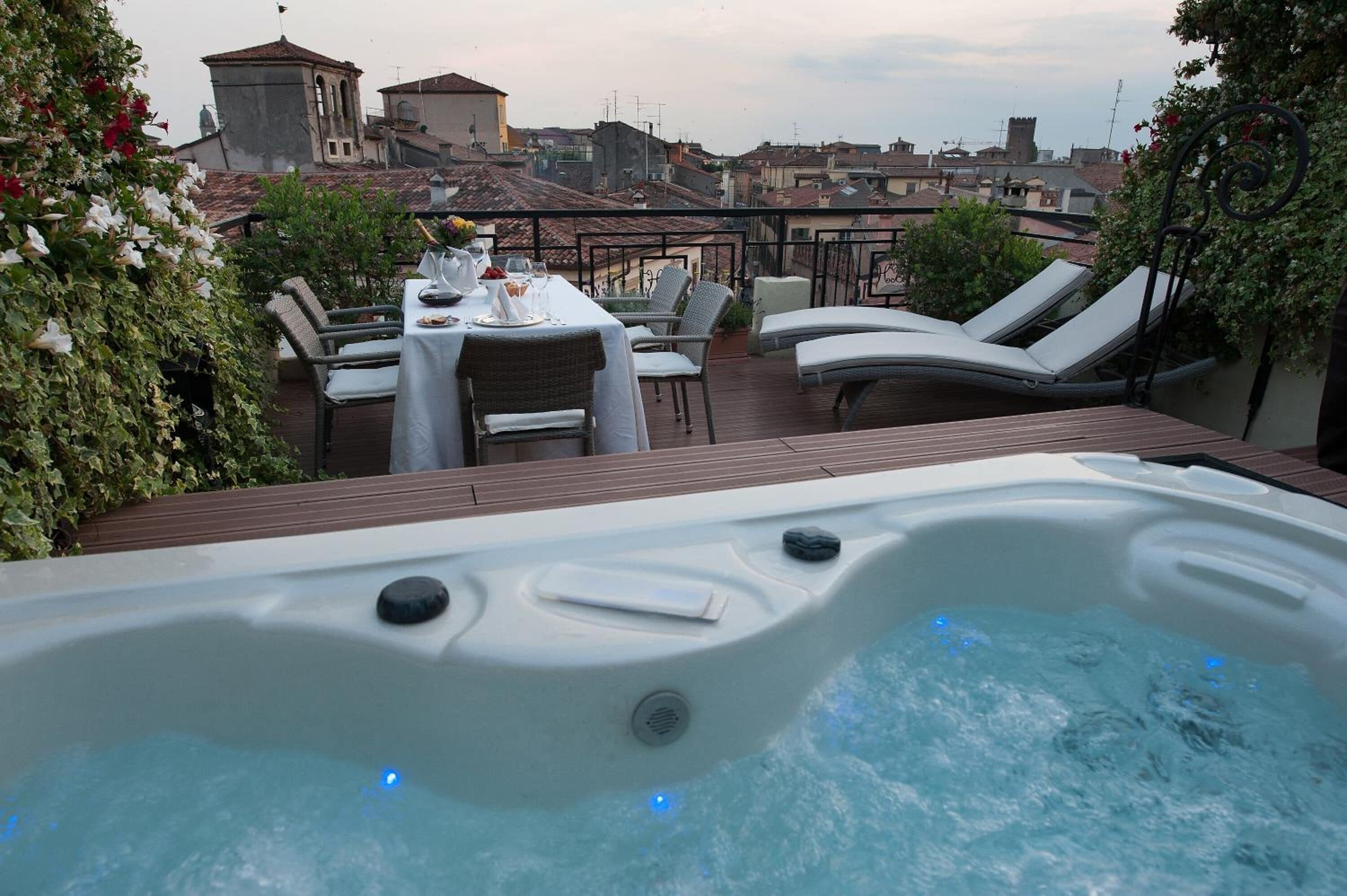 Suite with Terrace and Jacuzzi | Down comforters, minibar, in-room safe, desk