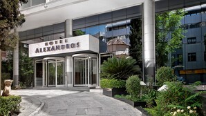 A hotel entrance with a sign reading "HOTEL ALEXANDROS". - Airotel Alexandros Hotel (Athens)