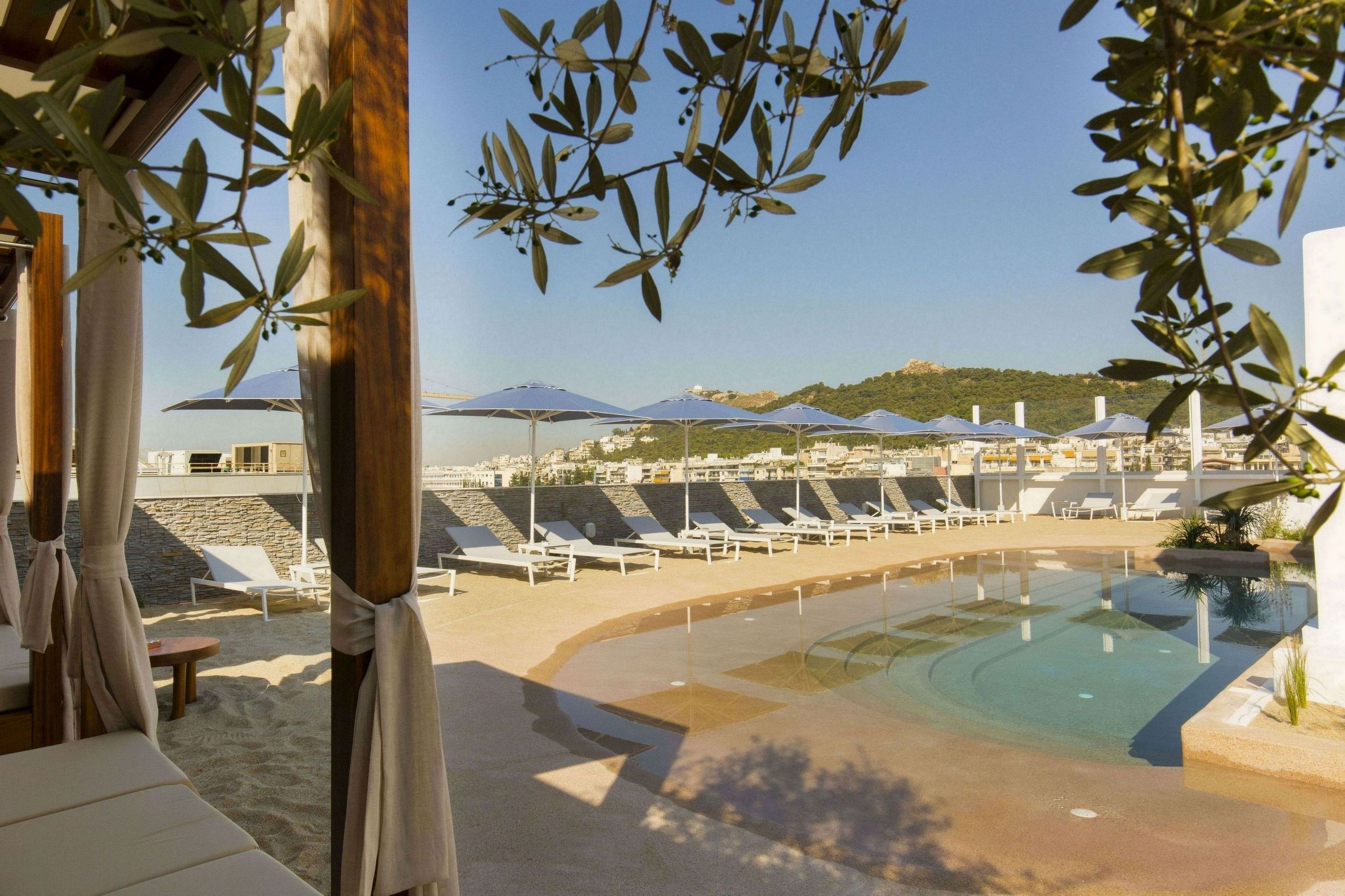 Seasonal outdoor pool, pool cabanas (surcharge), pool umbrellas