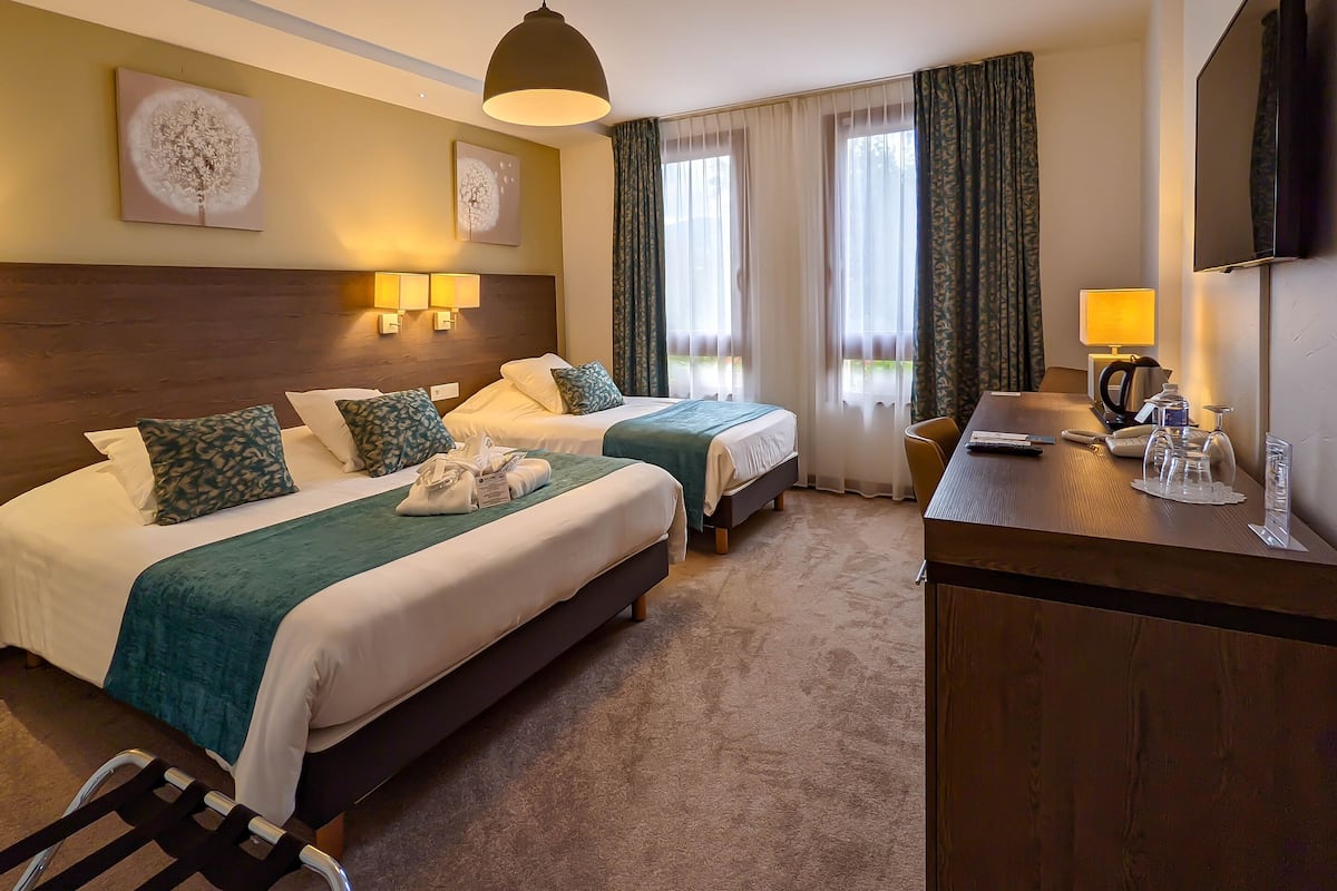 Superior Triple Room | Minibar, in-room safe, desk, free WiFi