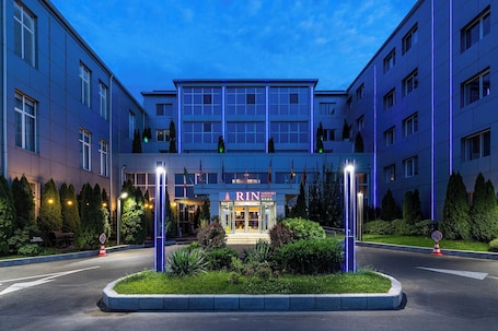 Front of property - evening/night. RIN Airport