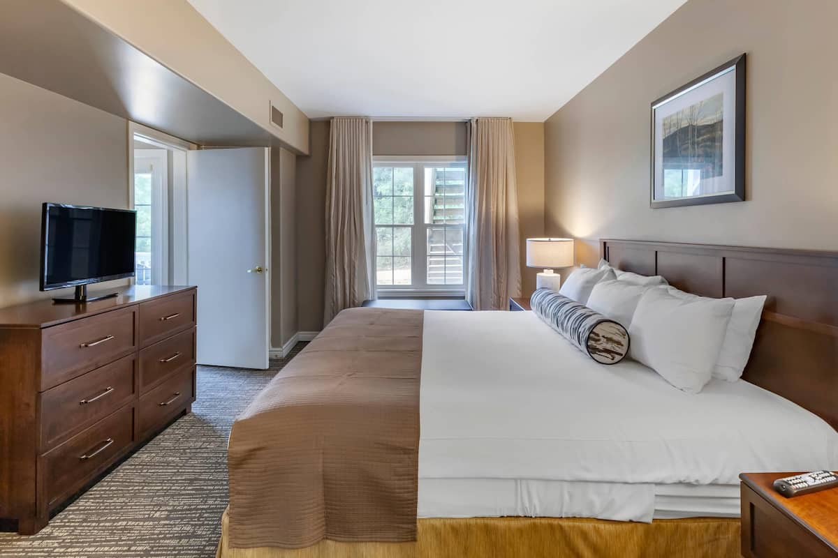 Premium bedding, blackout drapes, iron/ironing board, free WiFi