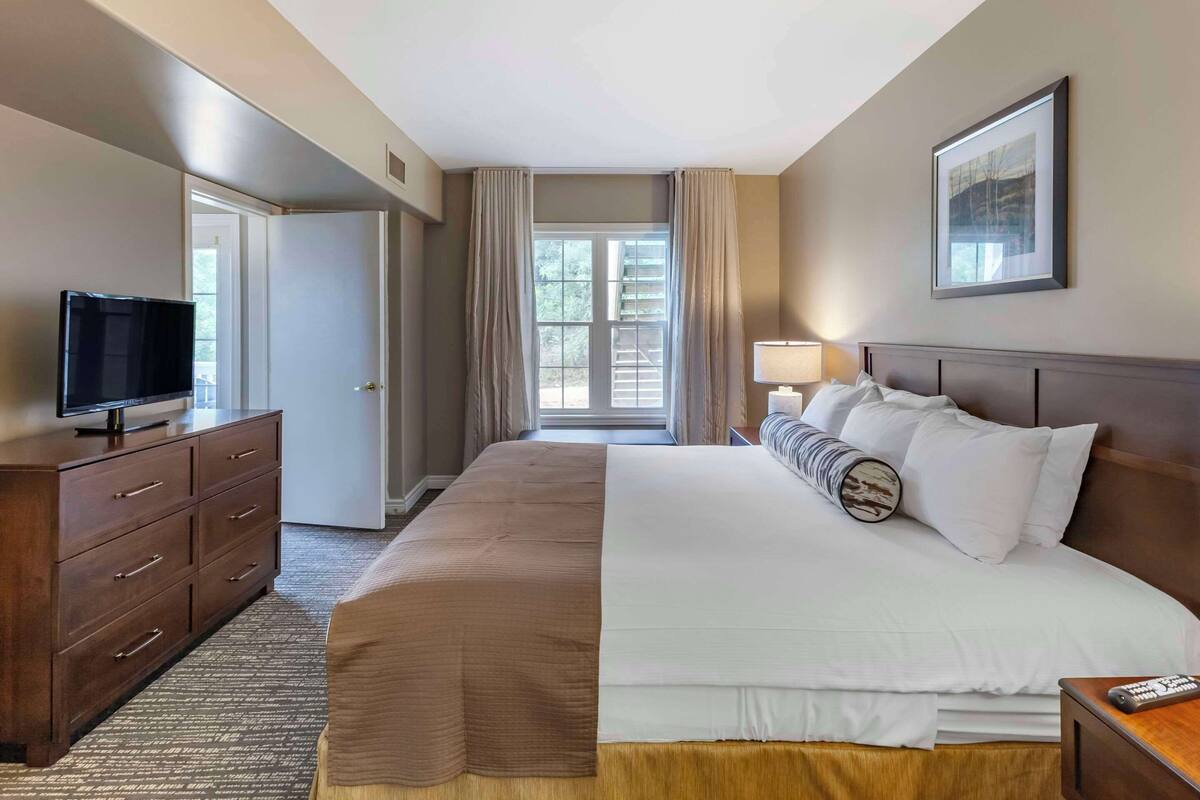 premium bedding, blackout curtains, iron/ironing board, free wifi