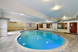 Indoor pool, open 7:00 AM to 10:00 PM, pool umbrellas, sun loungers