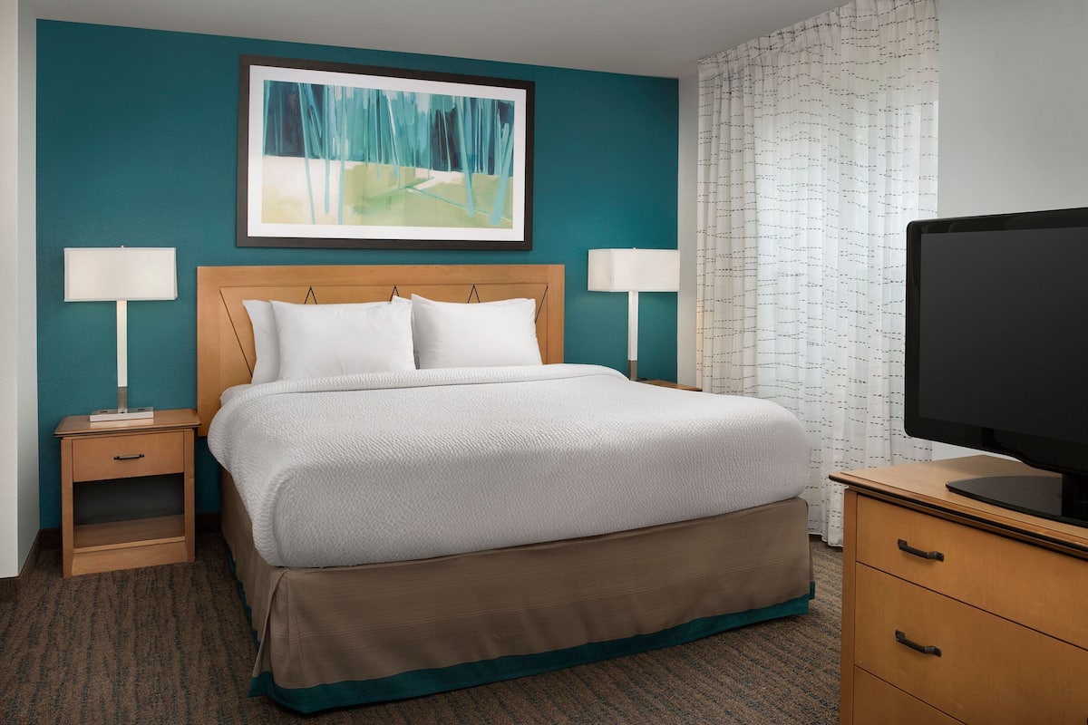 desk, laptop workspace, blackout curtains, iron/ironing board