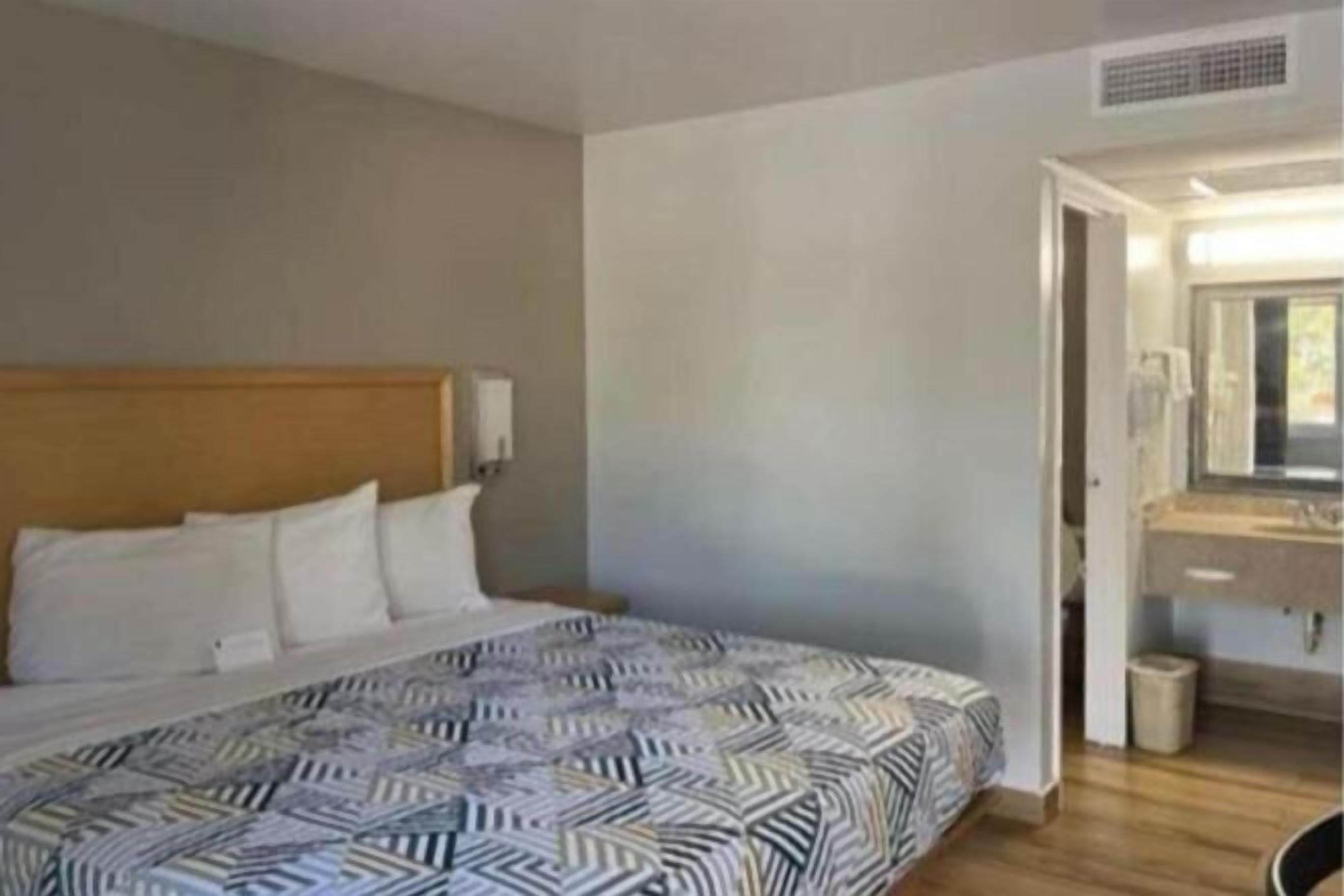 Desk, blackout curtains, iron/ironing board, free WiFi