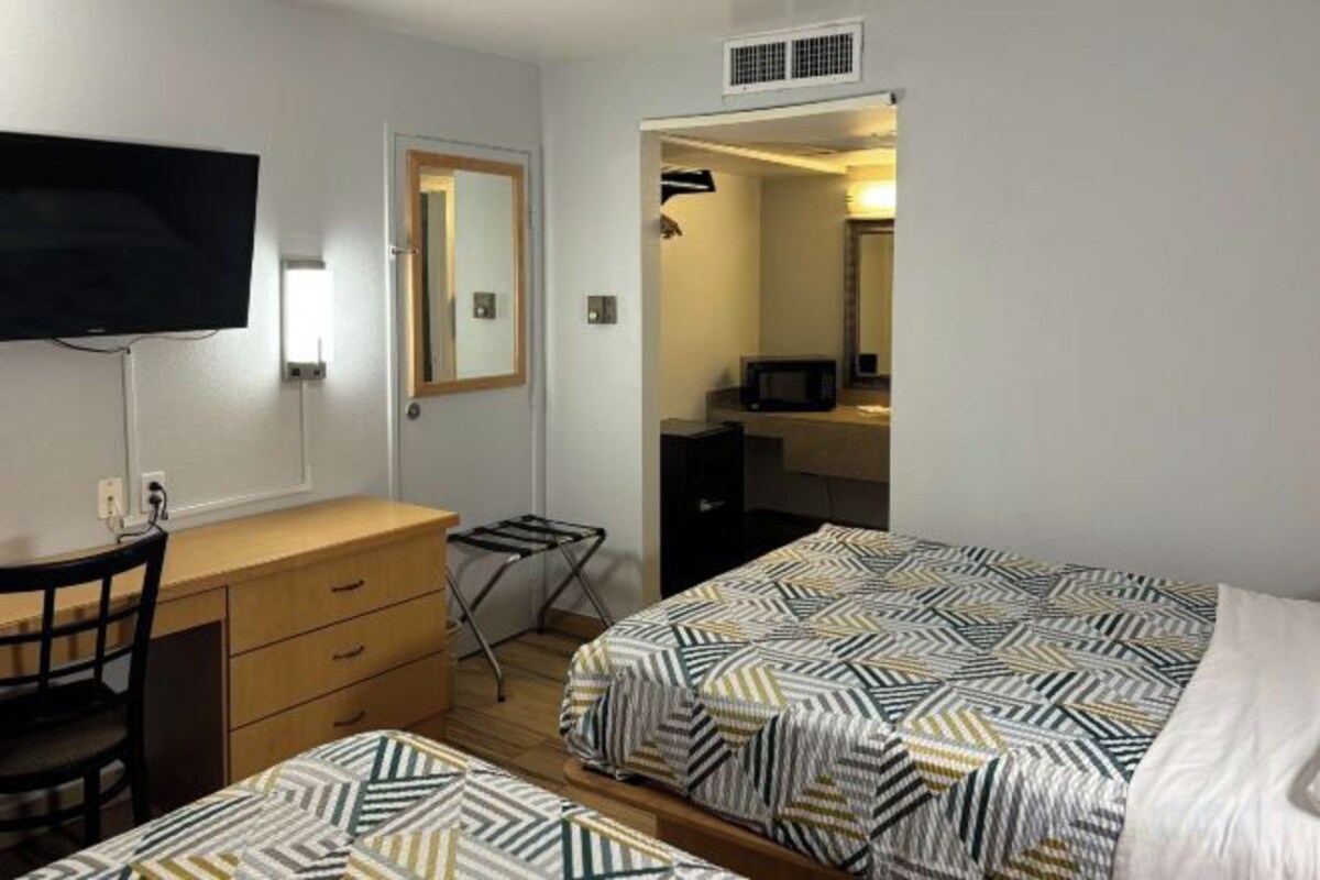 Desk, blackout curtains, iron/ironing board (on request), free WiFi