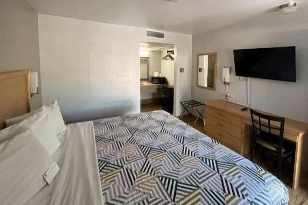 Desk, blackout drapes, iron/ironing board, free WiFi