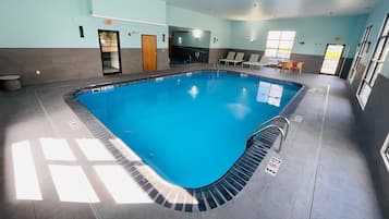 Indoor pool, open 6:00 AM to 11:00 PM, pool umbrellas, sun loungers