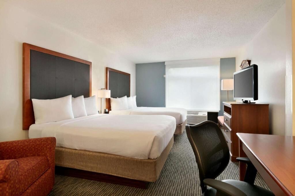 Down duvets, pillow-top beds, in-room safe, desk