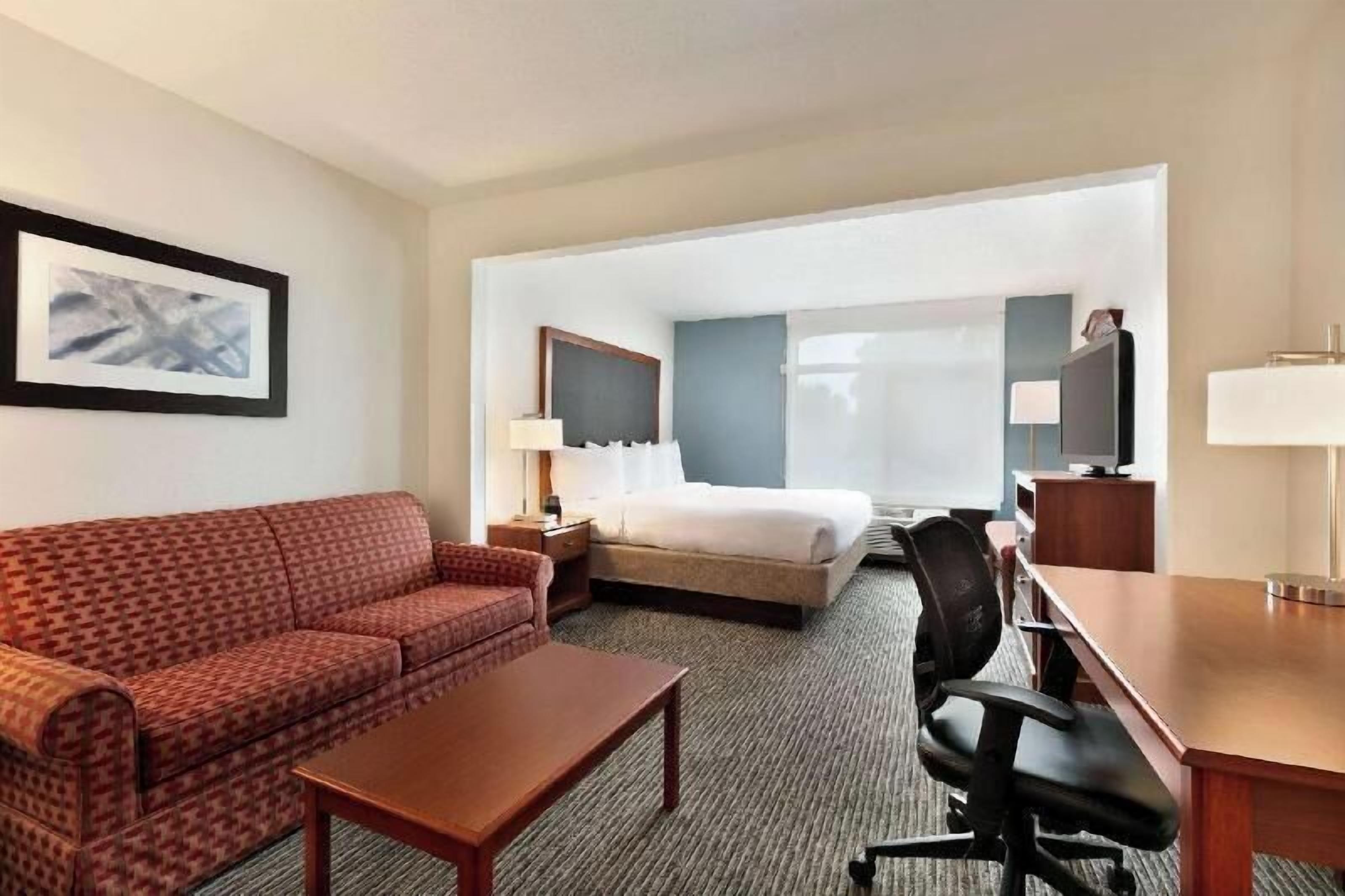 Down duvets, pillow-top beds, in-room safe, desk