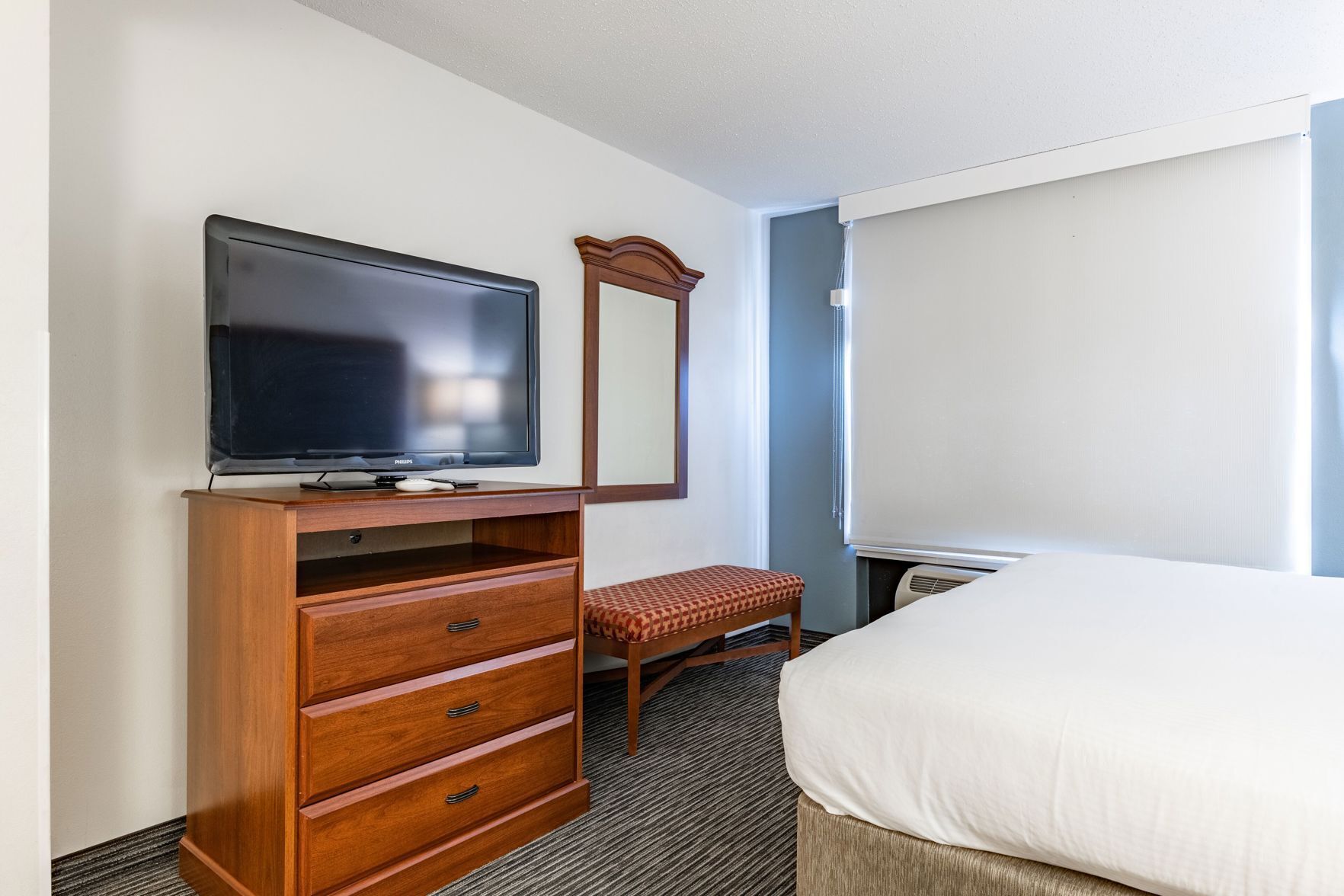 Down duvets, pillow-top beds, in-room safe, desk