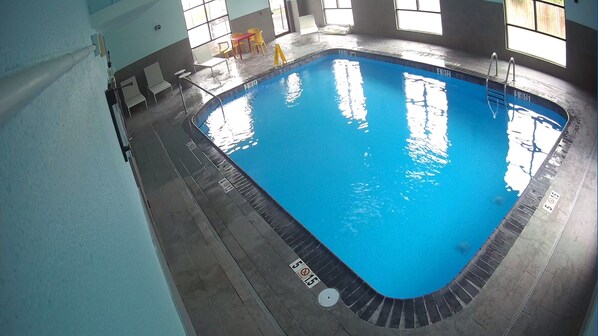 Indoor pool, open 6:00 AM to 11:00 PM, pool umbrellas, sun loungers
