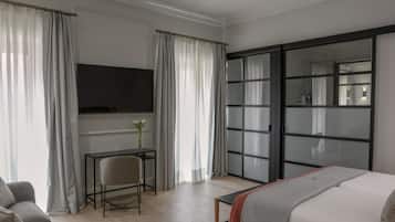 Suite junior, Terraza | 1 habitación, ropa de cama de alta calidad y edredón