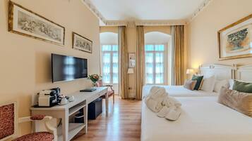 Premium bedding, down duvets, memory-foam beds, minibar