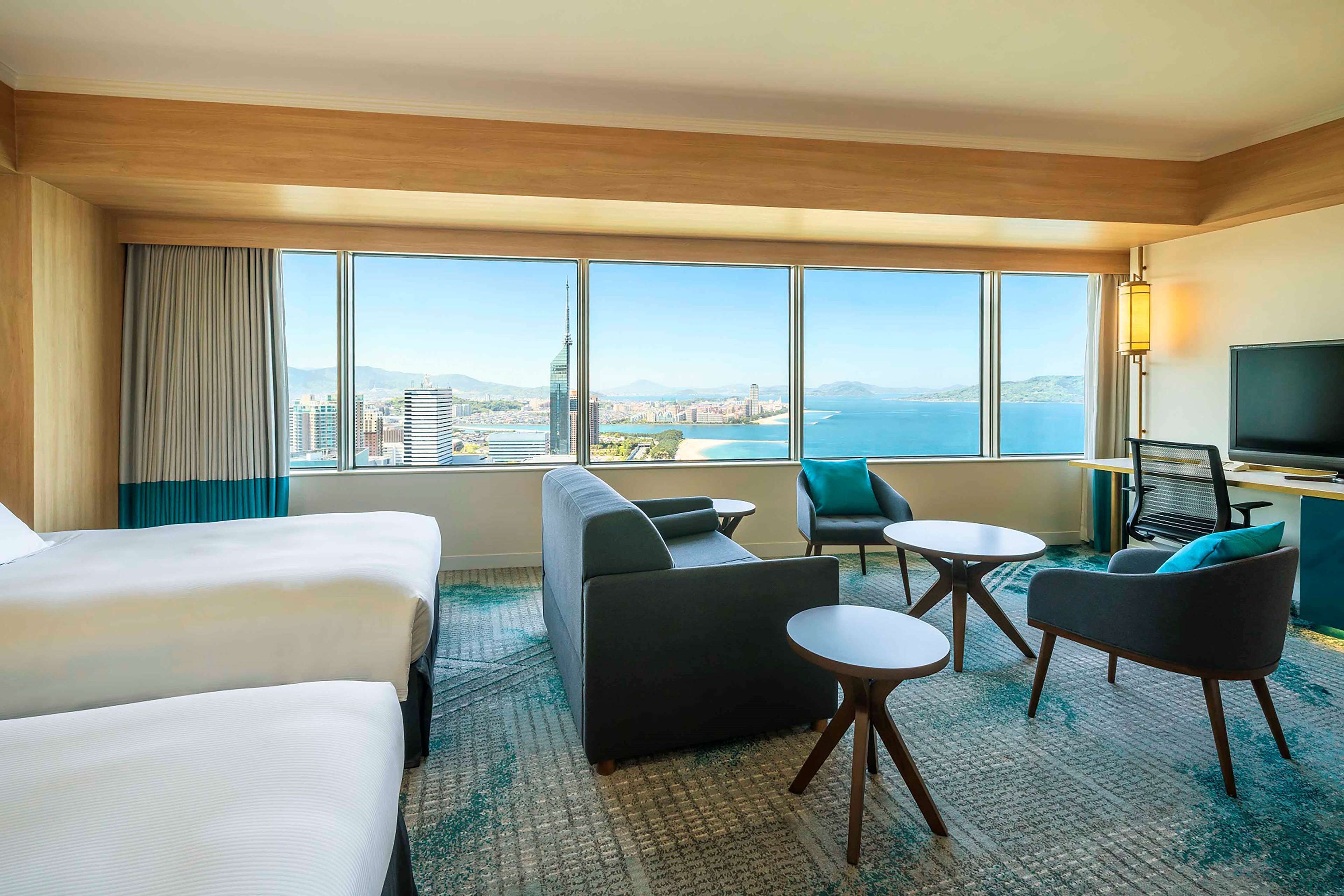 room (family premium deluxe) | living area | 40-inch flat-screen tv with digital channels, tv