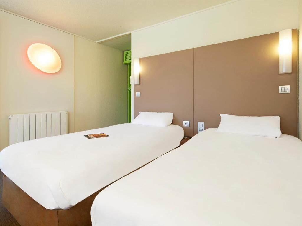 standard room, 2 single beds | premium bedding, individually furnished, desk, blackout curtains