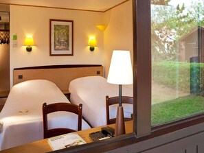 Premium bedding, desk, blackout curtains, soundproofing