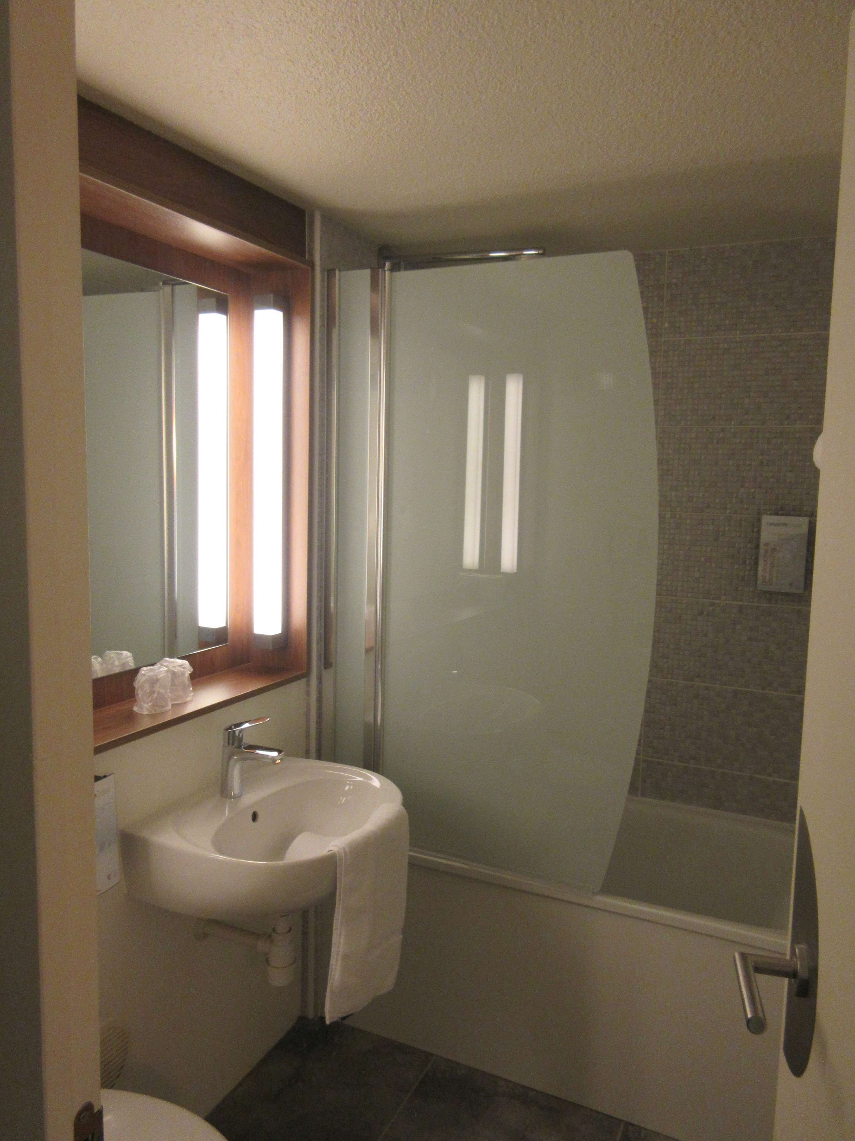 eco-friendly toiletries, hair dryer, towels