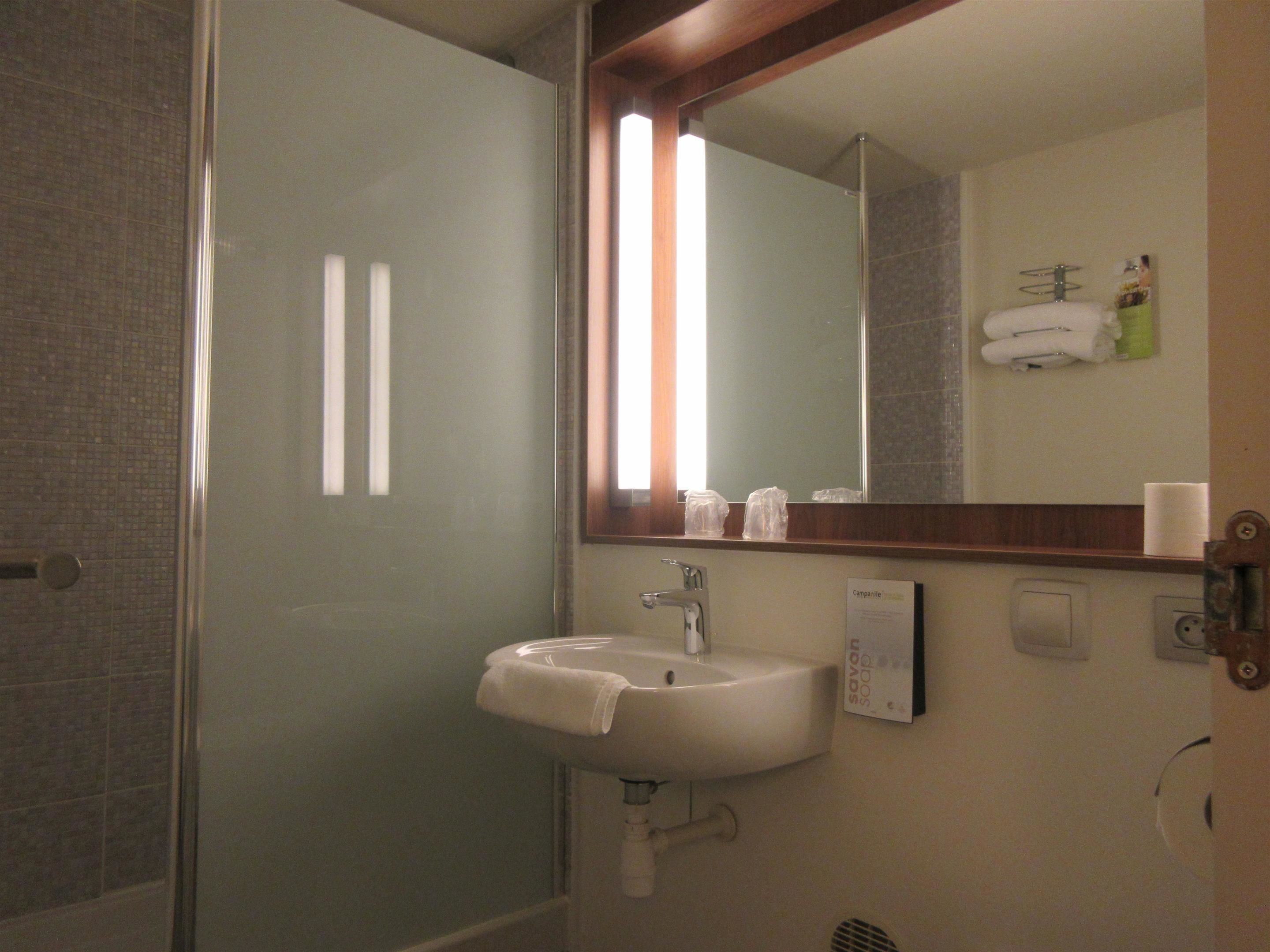 eco-friendly toiletries, hair dryer, towels