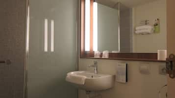Eco-friendly toiletries, hair dryer, towels