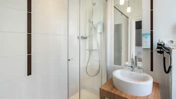 Shower, eco-friendly toiletries, hair dryer, towels