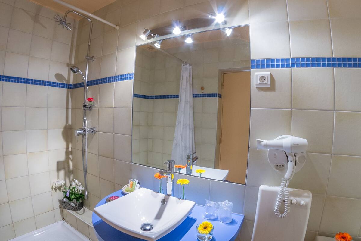 free toiletries, hair dryer, towels, shampoo