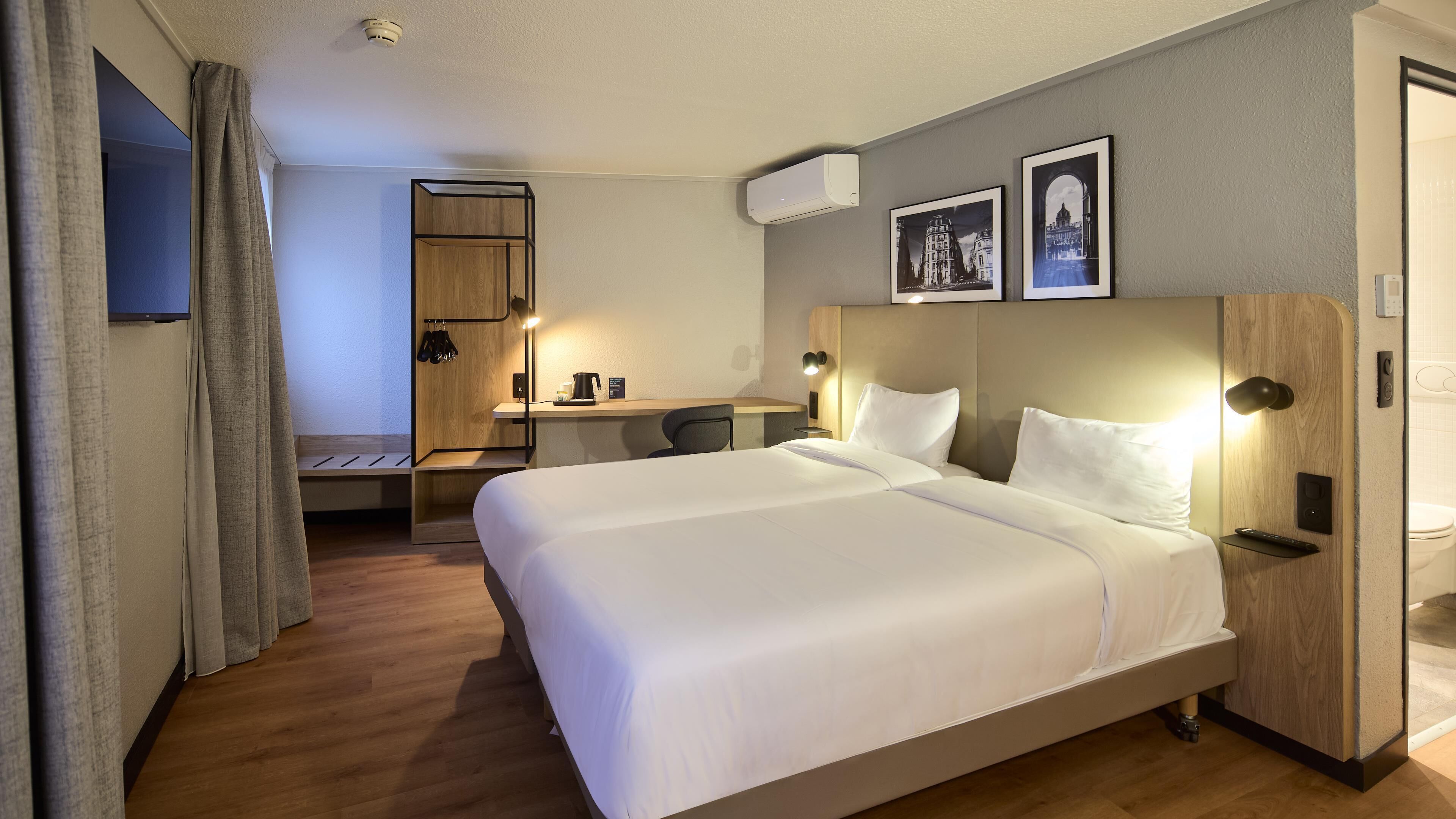 Premium bedding, desk, blackout drapes, soundproofing