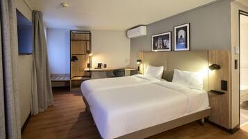 Premium bedding, desk, blackout drapes, soundproofing