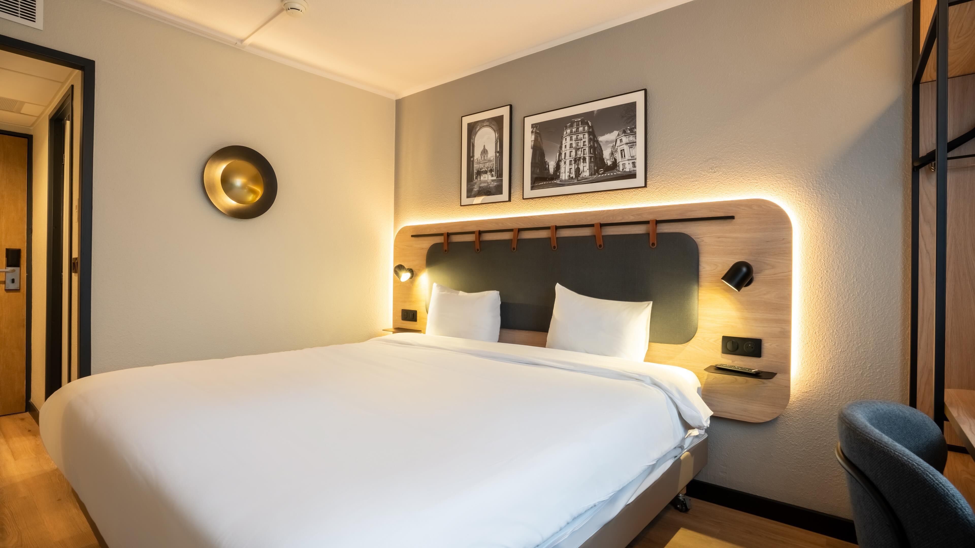 Premium bedding, desk, laptop workspace, blackout curtains