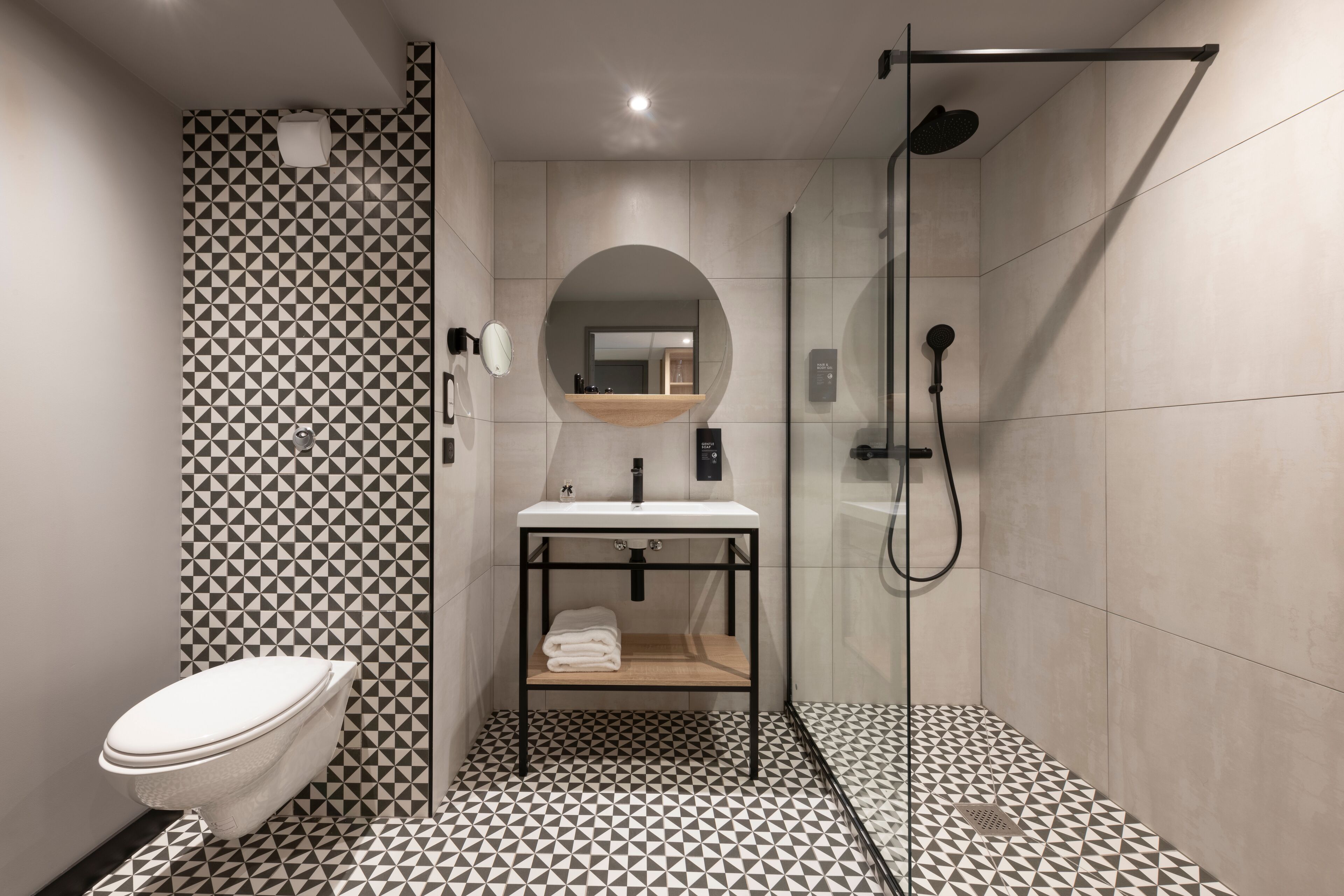 eco-friendly toiletries, hair dryer, towels