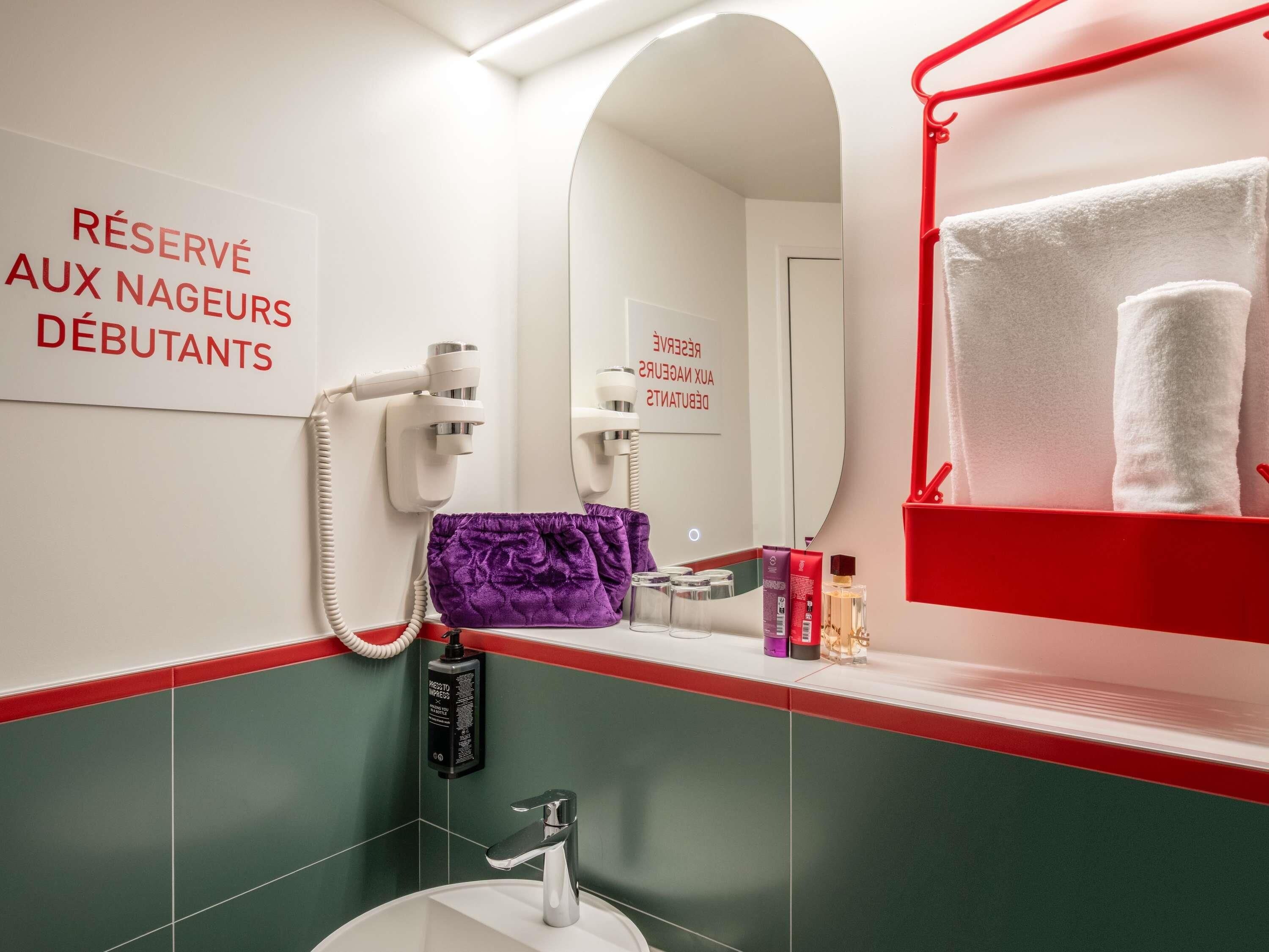 A bathroom with a sign indicating it is reserved for guests who are starting their stay.