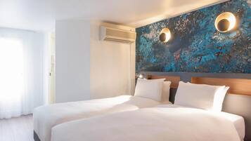 Een kluis op de kamer, een bureau, geluiddichte muren, gratis wifi