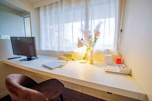 Premium bedding, desk, blackout curtains, iron/ironing board