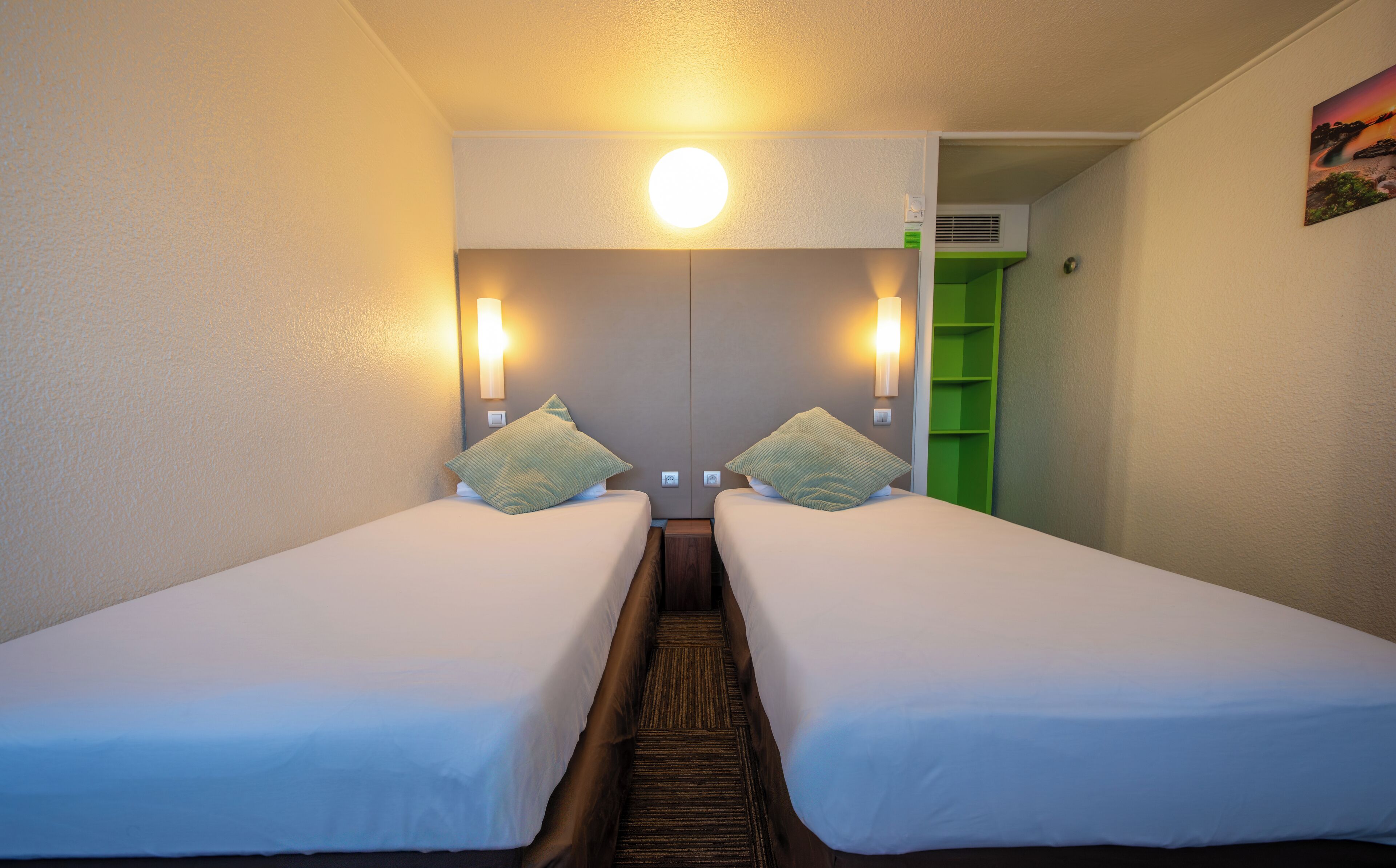 Premium bedding, desk, laptop workspace, blackout curtains