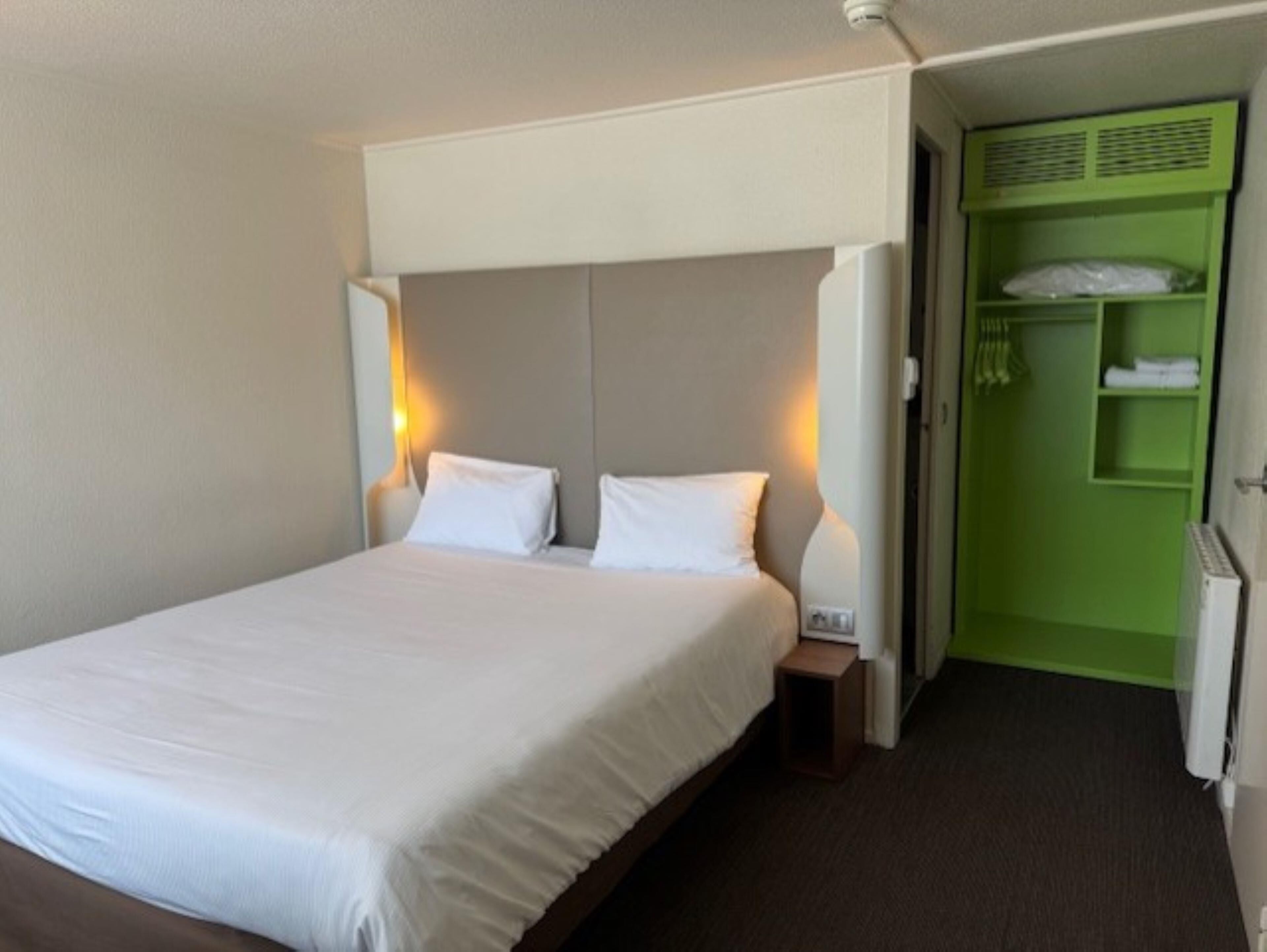 Desk, blackout curtains, soundproofing, iron/ironing board