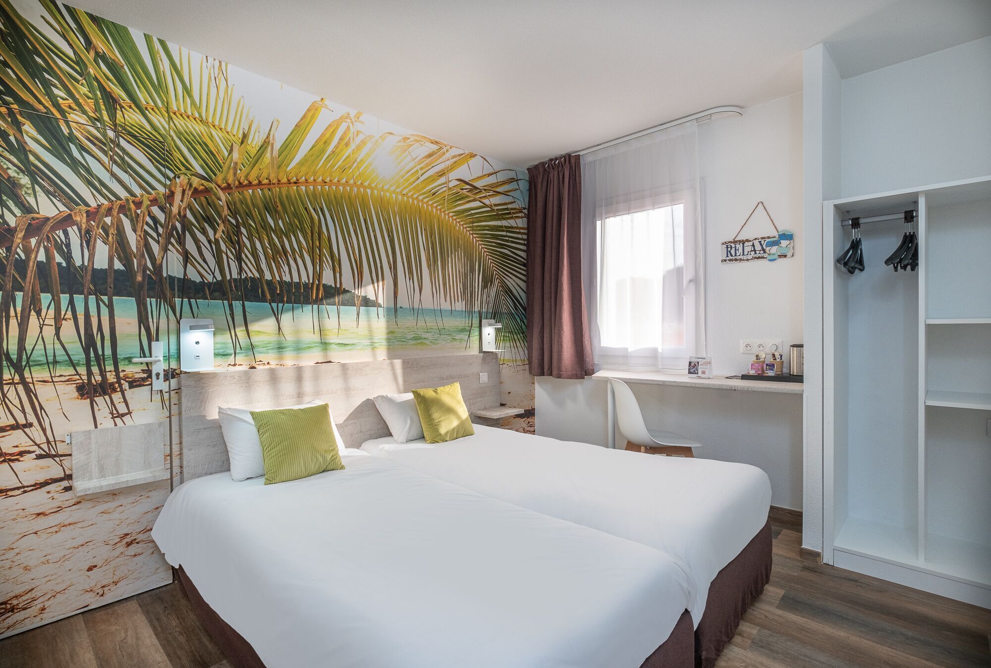 Premium bedding, desk, laptop workspace, blackout curtains