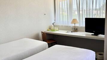 Standard Room, 2 Single Beds | Premium bedding, desk, soundproofing, free cots/infant beds