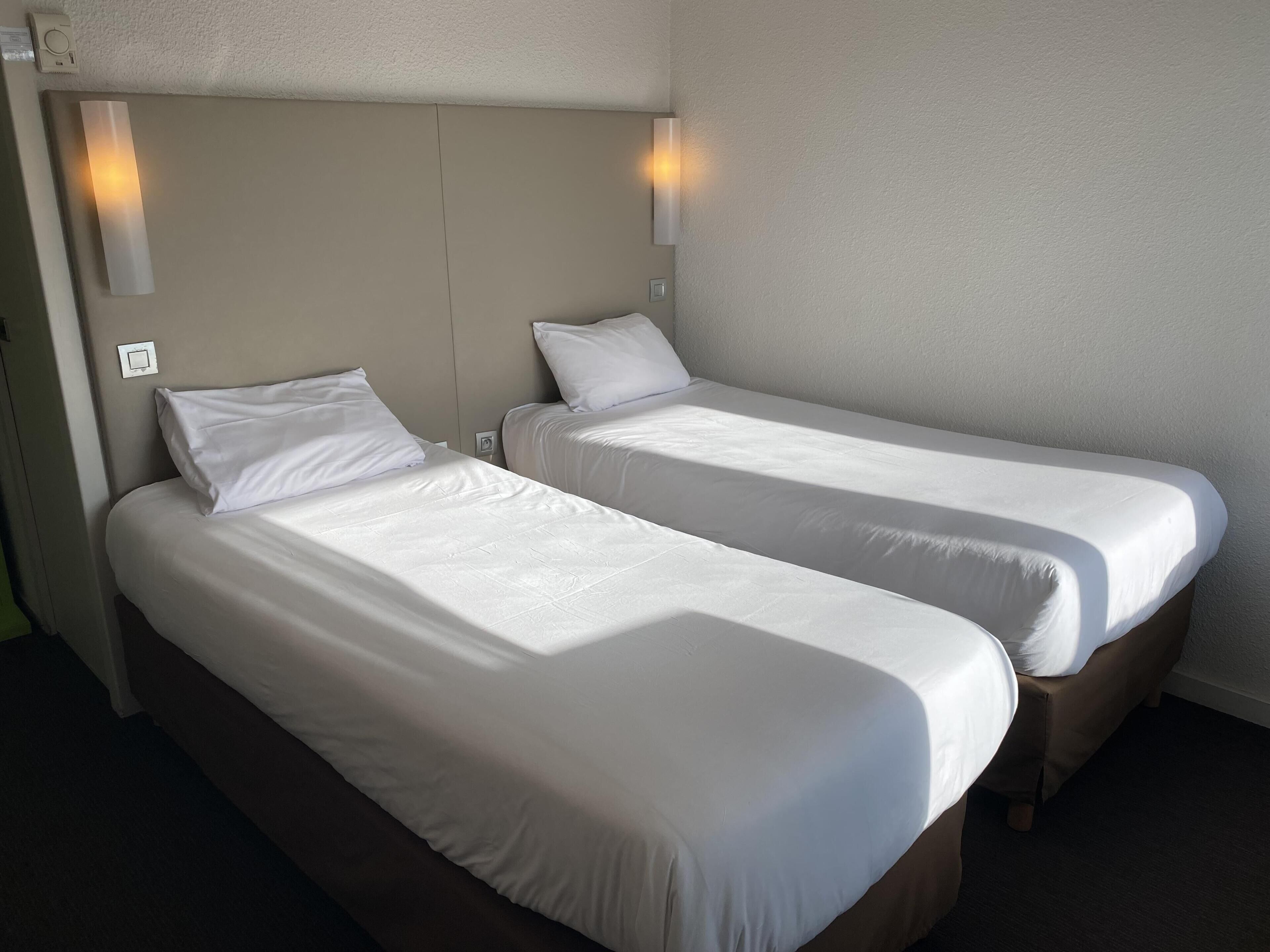 Chambre Standard, 2 lits une place | Literie de qualité supérieure, bureau, chambres insonorisées