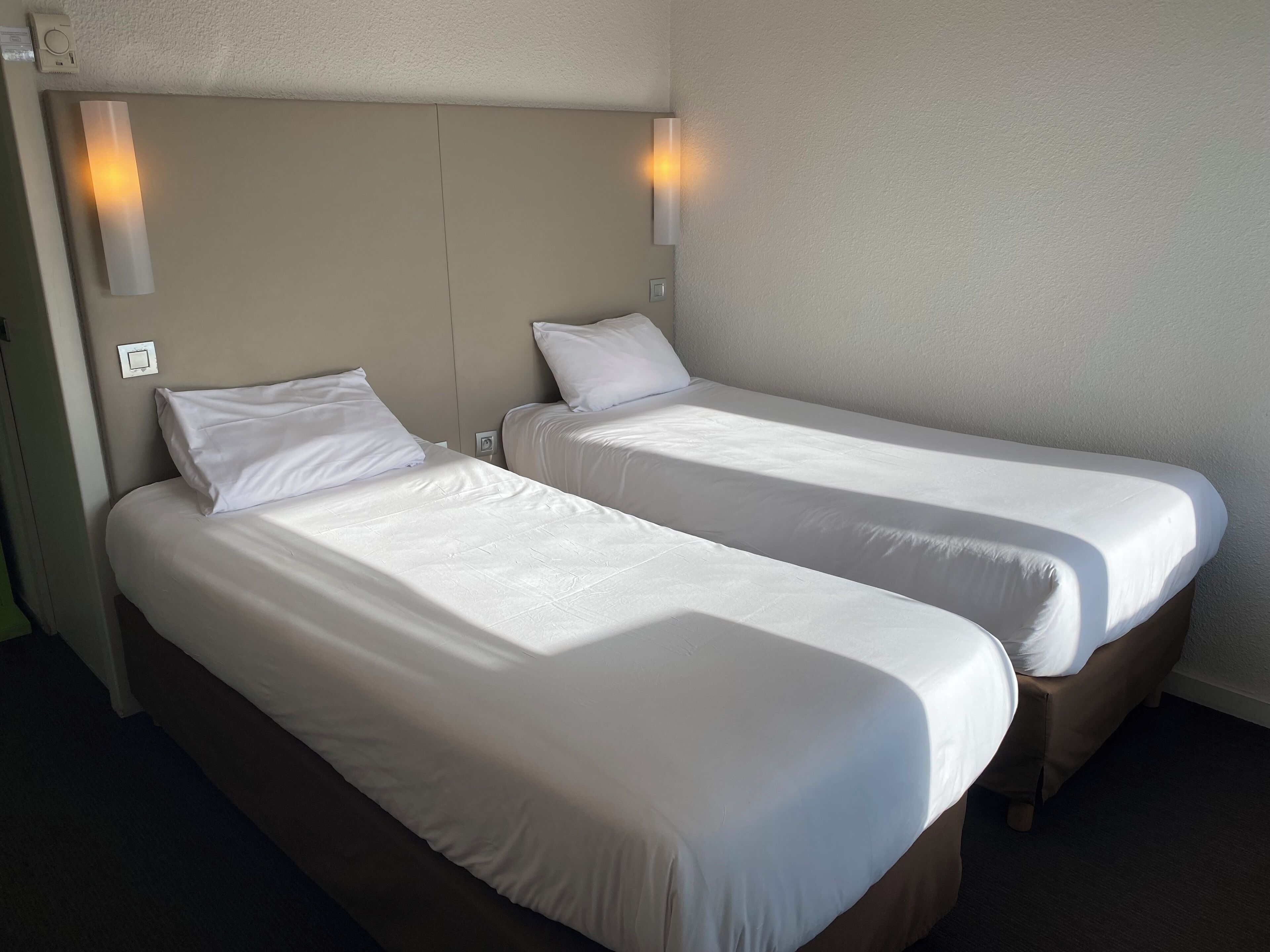 Standard Room, 2 Single Beds | Premium bedding, desk, soundproofing, free cots/infant beds