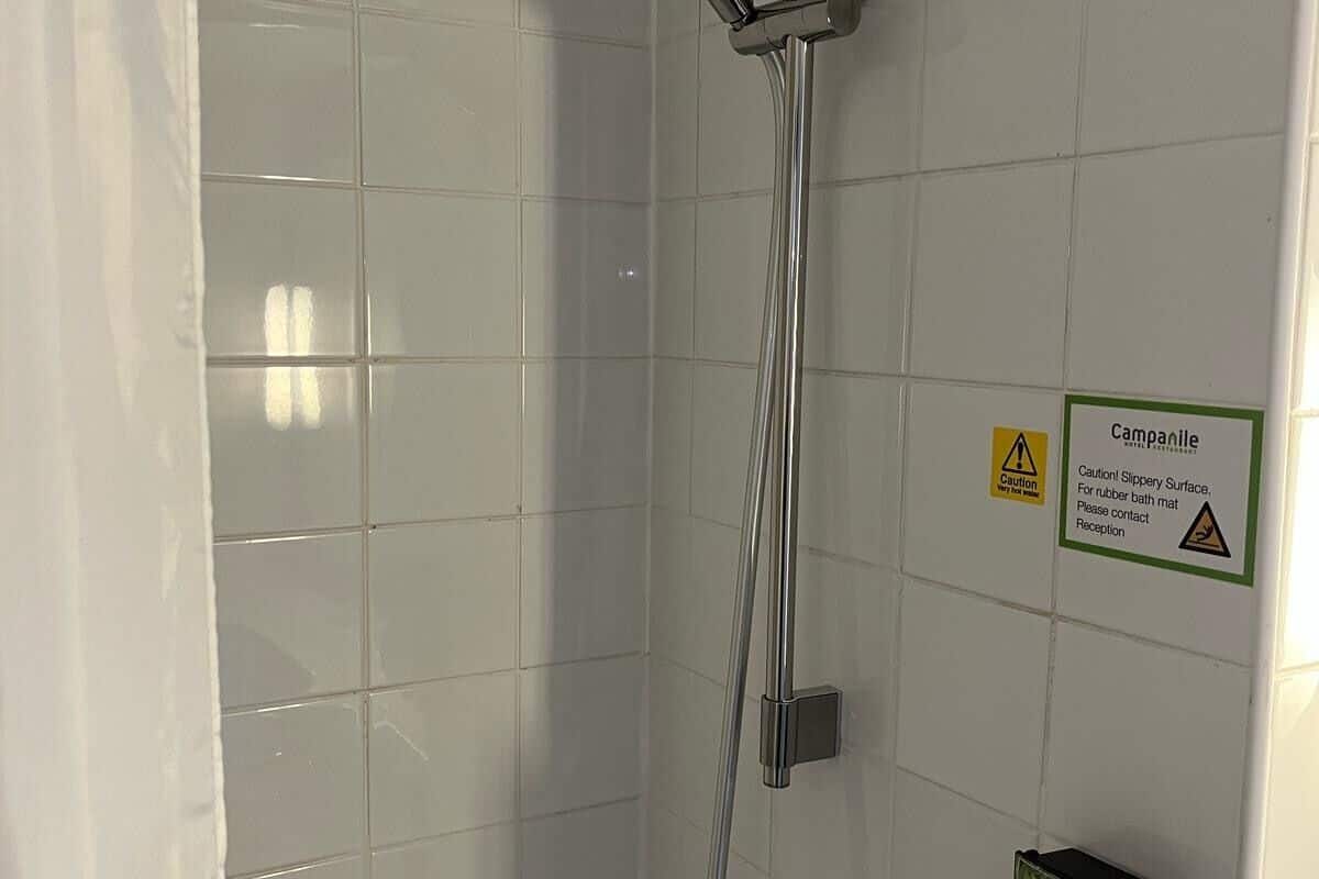 combined shower/bathtub, eco-friendly toiletries, hair dryer, towels