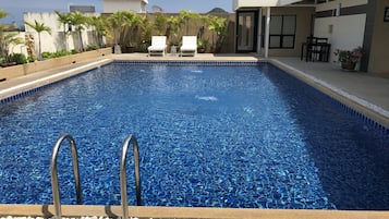 Outdoor pool, pool loungers